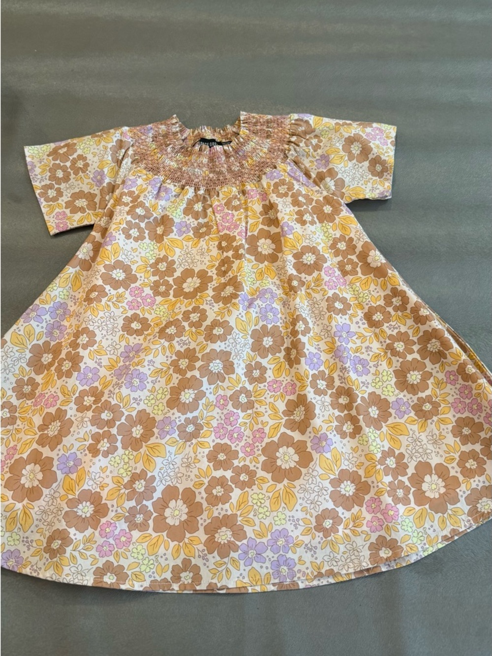 Space Grey Floral Smocked Top in Blush and Yellow. Size 3